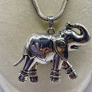 Silver Elephant Pendant on a Silver tone Chain Necklace. 18 inches long.
